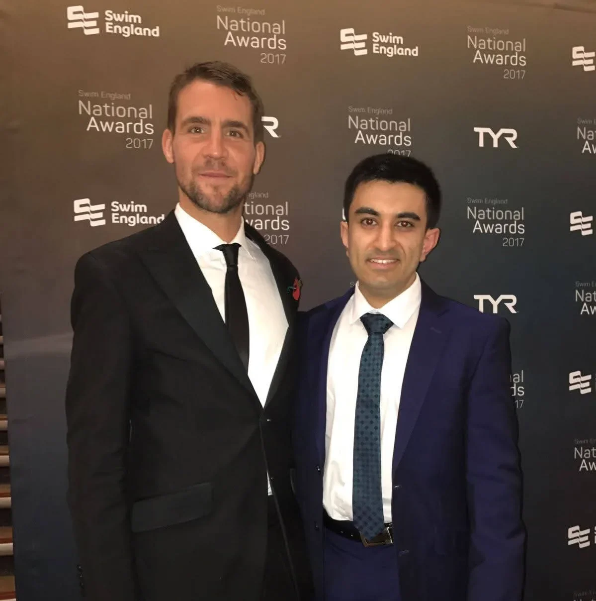 Ashley Varjavand standing with Leon Taylor at the Swim England National Awards 2017.